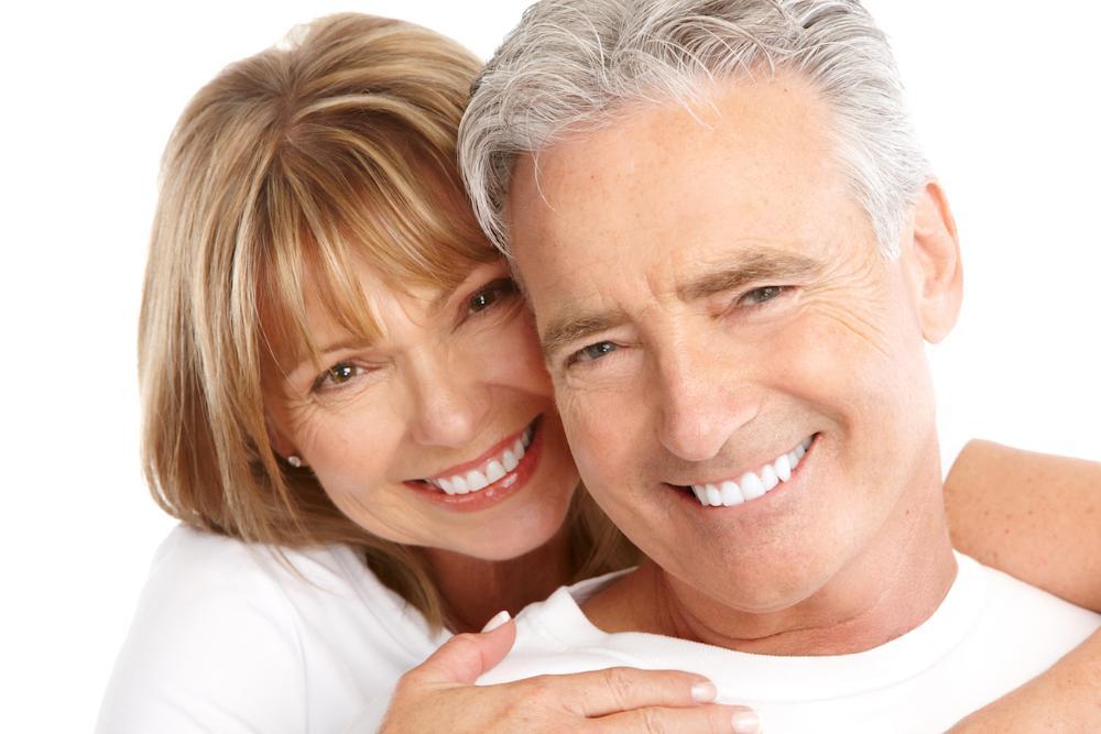 Couple smiling at tooth extraction dentist near me Tampa, FL