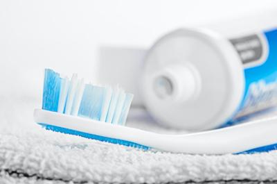 Toothbrush and tooth paste at dentist in North Tampa, FL