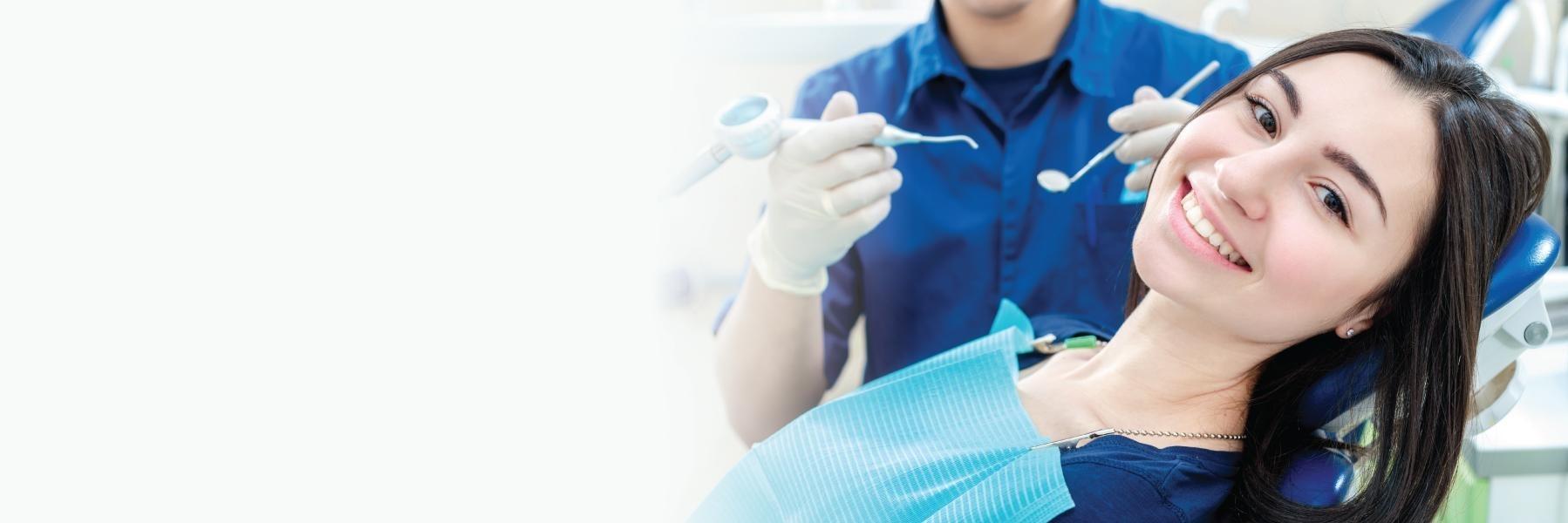 woman smiling in the dental chair