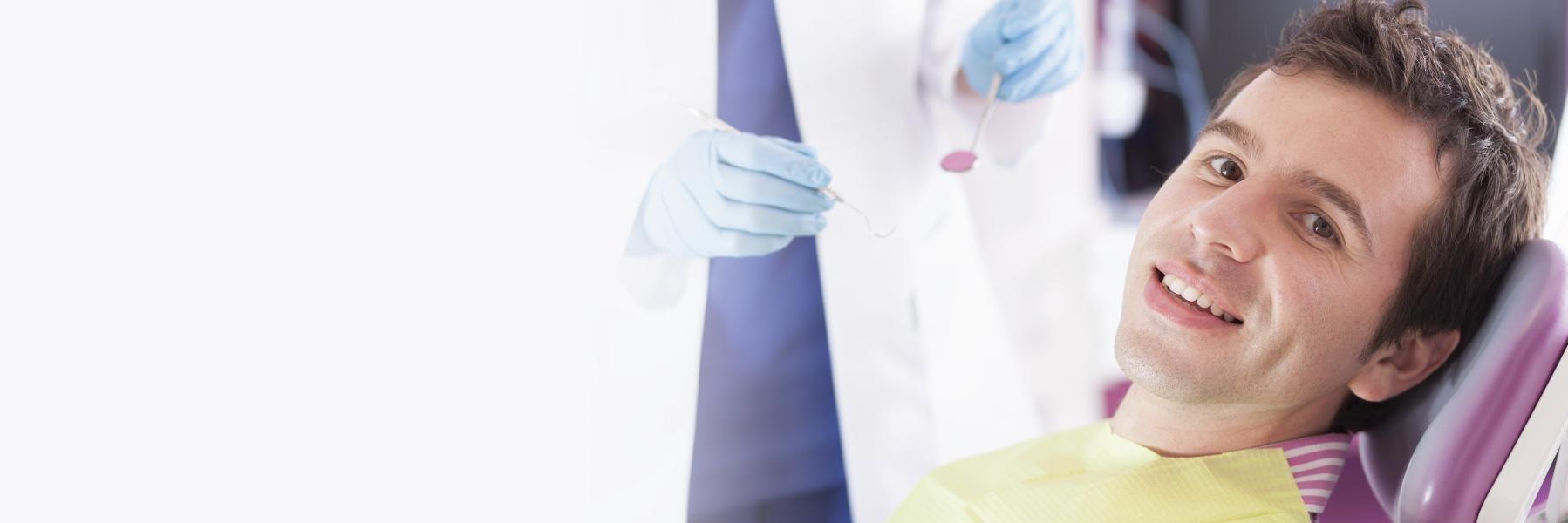 man sitting in the dental chair