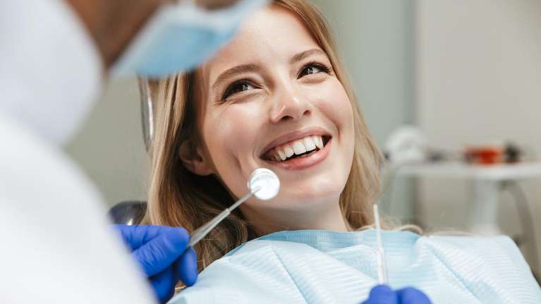 A girl with white teeth and a bright smile in Tampa